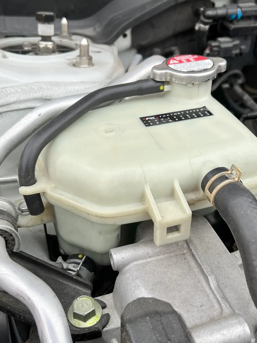 Purpose of online coolant reservoir